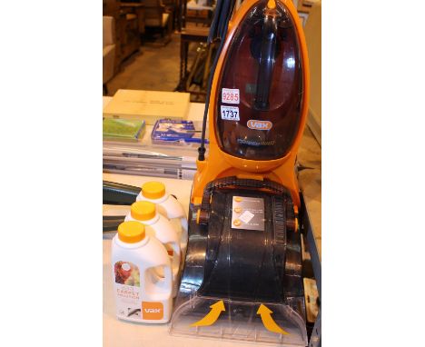 Vax electric carpet cleaner with cleaning liquids. Not available for in-house P&P, contact Paul O'Hea at Mailboxes on 01925 6