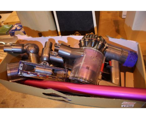 Dyson Sv05 wall mounted cordless vacuum with charger and accessories. Not available for in-house P&P, contact Paul O'Hea at M