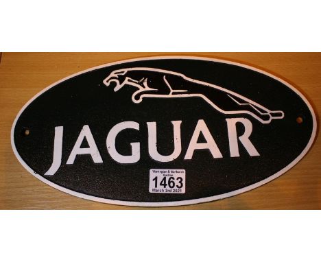 Cast iron Jaguar sign, L: 35 cm. P&amp;P Group 2 (£18+VAT for the first lot and £3+VAT for subsequent lots) 