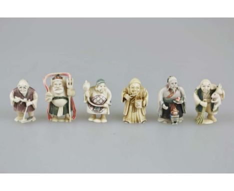    Konvolut sechs Netsuke, Japan, vier Elfenbein, part. polychrom gefasst, jew. mit Signatur, versch. Gewerke, H.: ca. 5 cm, 