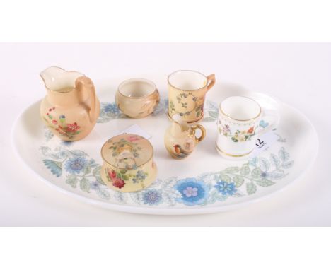 Five miniature Royal Worcester cabinet pieces to include jugs, a bowl and mugs, etc, and a miniature Wedgwood mug