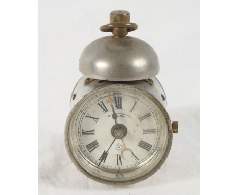 A late 19th Century Ansonia alarm clock in drum-shaped case