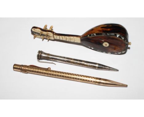 A tortoiseshell and mother-of-pearl model of a mandolin, a Maxim rolled gold propelling pencil and an Eversharp propelling pe