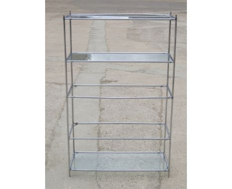 A four-shelf tubular chrome display stand with glass shelves, 32" wide, and a similar five-shelf stand, 34" wide