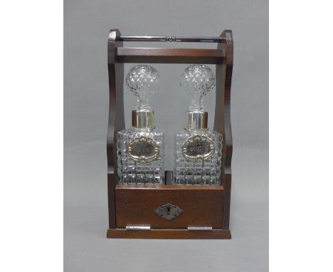 Modern Tantalus with a pair of glass spirit decanters with stoppers to include two Epns decanter labels - Gin &amp; Scotch 