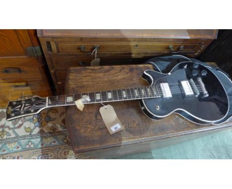 A Hondo II Les Paul style electric guitar, with associated soft case, Condition: missing 1st and 2nd string, enamel to rhythm