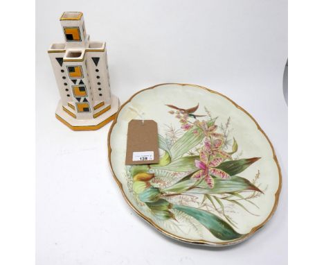 A Limoges dish, with gilt scalloped rim, hand-painted with a hummingbird amongst flowers, W.38 D.30cm, together with a Belgiu