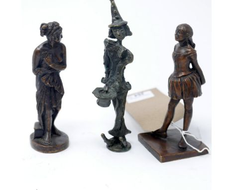 A bronze figure of a clown and 2 others. H.17cm 