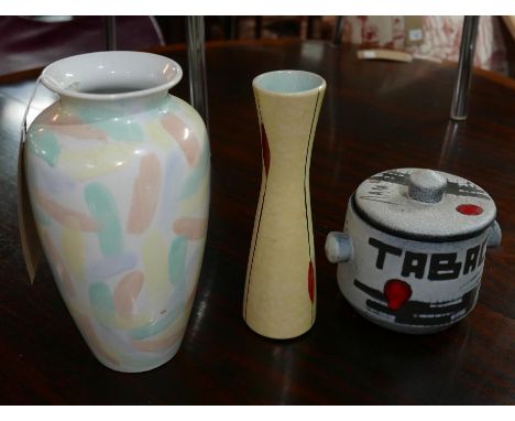 A Poole pottery vase together with two other ceramic vases 