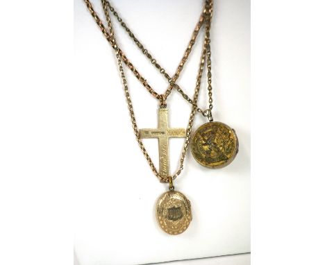 A 9ct gold cross; a yellow metal oval locket with foliate engraved decoration; two yellow metal chains; and a locket in the f