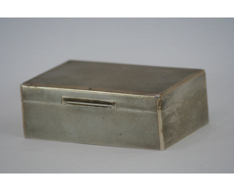 A silver mounted two compartment table cigarette box, with wood lined interior, engine turned decoration, inscribed "Govett &