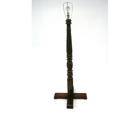 A mahogany turned and fluted column standard lamp