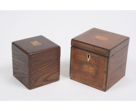 A small early 19th Century Sheraton style mahogany and rosewood cross banded tea caddy, with inlaid shell paterae and ivory e