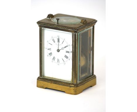 A brass cased carriage clock, with strike repeat movement, (AF)