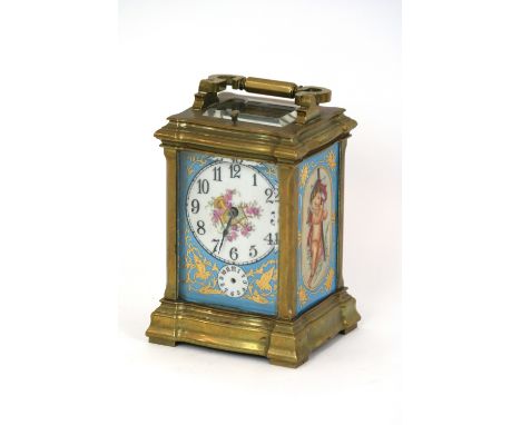 A brass cased carriage clock, having Sevres style panels, striking alarm repeat movement, 15cm high