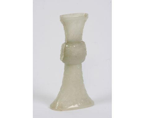 A late 18th/early 19th Century Chinese delicately carved pale celadon jade Gu vase, worked with scrolled and floral sprays, 2