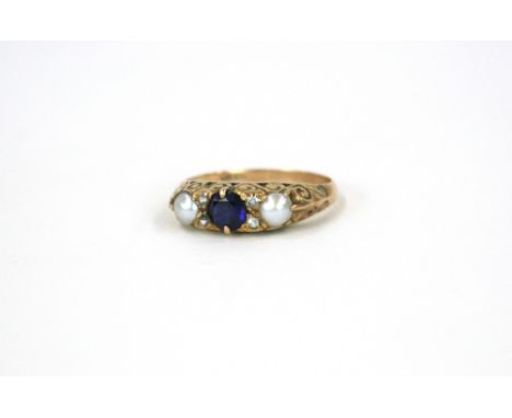 A 9ct gold pearl and sapphire mounted ring 