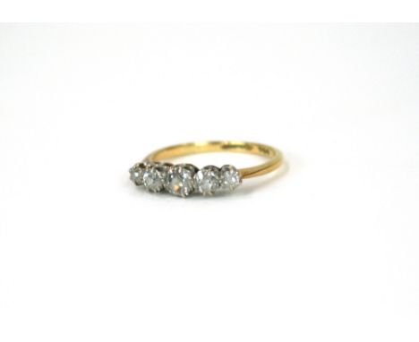 An 18ct gold five stone diamond ring 