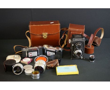 A collection of mixed photographic equipment to include Meopta viewfinder camera. filters, camera bodies...etc. 