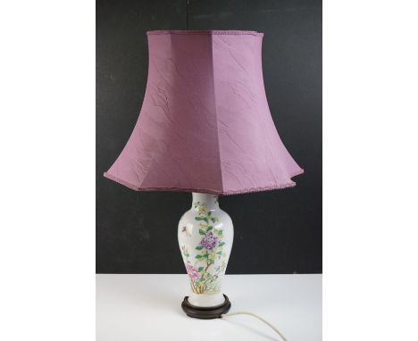 Chinese Famille Rose porcelain vase converted to a table lamp, of baluster form, with floral and butterfly decoration on a wh