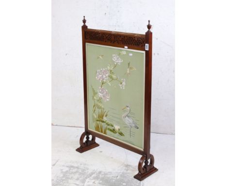 Victorian Mahogany Firescreen with blind fretwork carving, inset with a Chinese style silk embroidery depicting cranes within