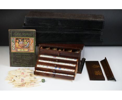 Early-to-mid 20th Century Mah-jong set with 144 ceramic tiles, 4 blank tiles, dice, and a large quantity of plastic playing p