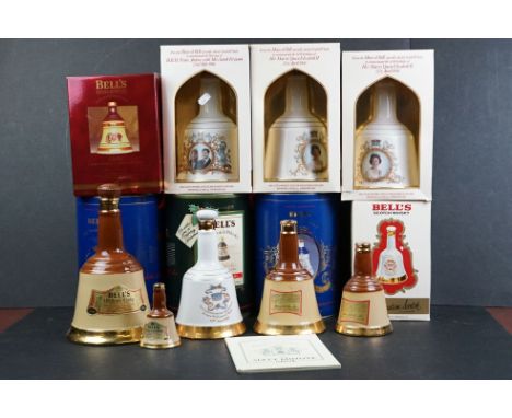 A collection of ceramic Bell's whisky bottles to include commemorative examples. 