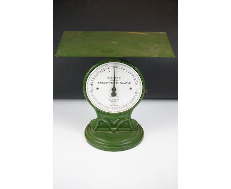 Salter's ' Improved Railway Parcel Balance ' cast iron scales, with white enamel dial and green painted body, raised on a cir