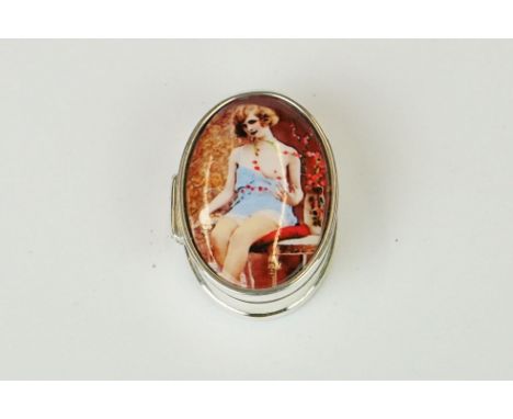 Silver oval shaped pillbox with semi-nude enamel panel 