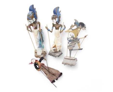 Three Thai  carved wooden puppets and similar wooden puppet. Tallest 65cm high. Condition - fair