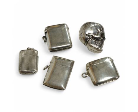 A late Victorian ribbed silver vesta case, Joseph Fray, Chester, 1885, 40mm, together with four other later silver vesta case
