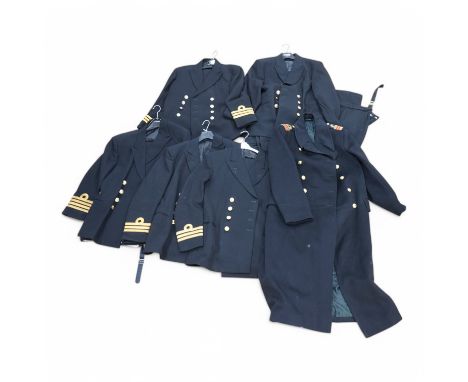 A Royal Navy officer's great coat, cap and four other Navy Officer's jackets. Condition - fair/good