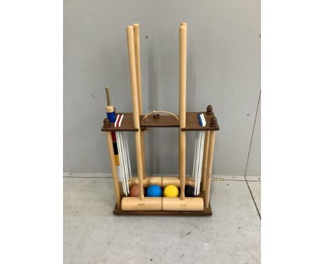 A Jaques four mallet croquet set, height 98cm. Condition - good