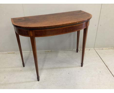 A George III banded mahogany D shaped folding card table, width 99cm, depth 48cm, height 73cm. Condition - poor to fair