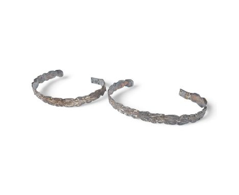 A pair of silver plated curtain tiebacks, cast leaf design, length 39cm. Condition - good