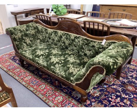 A Victorian mahogany scroll arm settee, width 200cm, depth 62cm, height 86cm. Condition - fair to good