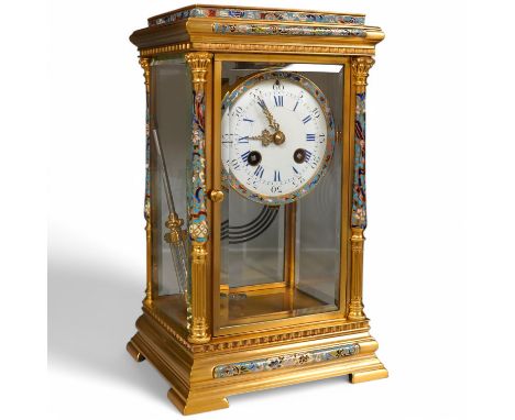 A late 19th century French ormolu and champlevé enamel four glass mantel clock, with mercury filled pendulum, retailed by Map