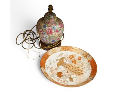 A Japanese Kutani dish, signed, Meiji period, and a Chinese famille rose hundred flower lamp base, charger 37cm diameter. Con