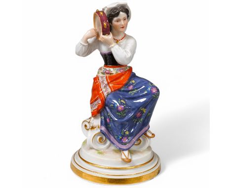 A late 19th / early 20th century Meissen porcelain figure of a maiden with tambourine, incised L139, 20cm high. Condition - a