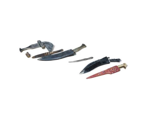 A collection of daggers and knives to include a Kukri, Jambiya and an Indian niello work example, largest 34cm in length. Con