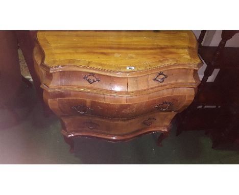 An Early 20th Century Walnut Inlaid and Crossbanded Bombe Shaped Chest of Drawers; with two cushion frieze drawers and two lo