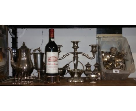 A Box Lot of Silver Plate, to include a three branch candlestick, toast rack, Newbridge bottle coaster and bottle of Chateau 