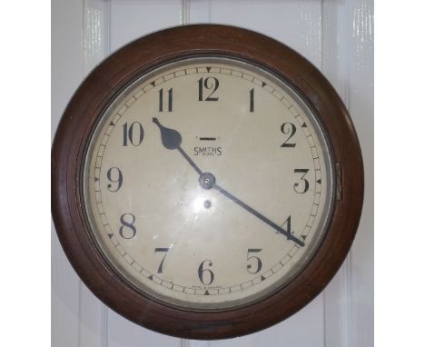 A Smiths Eight Day Dial Clock; with Arabic numerals and spring wound movement.