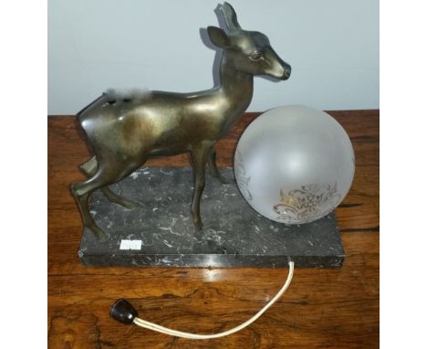 An Art Deco Design Figural Table Lamp formed as a Bronzed Metal Deer;  standing on a marbled slate base with globe etched gla