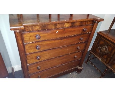 An Early 19th Century Mahogany Scotch Chest of Drawers; with five graduated drawers.