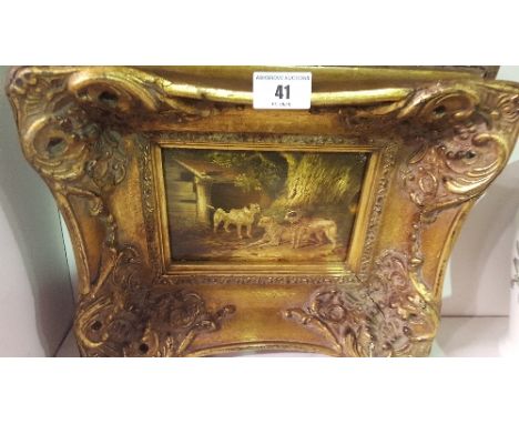 A Print of Dogs in a Gilt Frame.