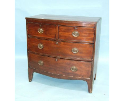 A late-Georgian mahogany bow-fronted chest of two short and two long cockbeaded drawers, on bracket feet, 87cm wide, 90cm hig