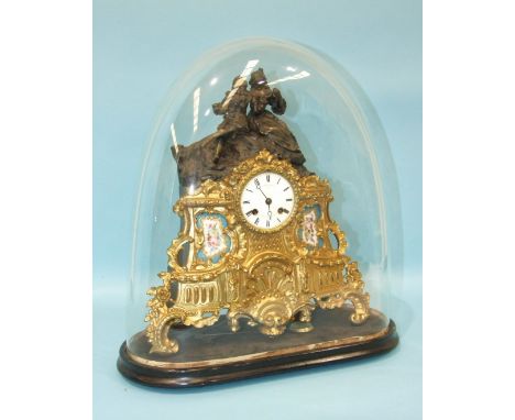 A 19th century French spelter mantel clock, the part-bronzed part-gilt figural case with two Sèvres-style porcelain plaques a