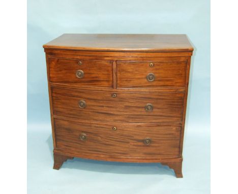 A mahogany bow-fronted chest of two short and two long drawers, on bracket feet, 87cm wide, 87cm high.