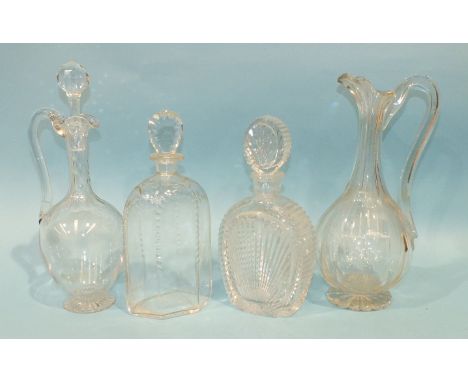 A 19th century hexagonal cut-glass decanter, 26.5cm high, a cut-glass wine jug, 30cm high and two others, (4).